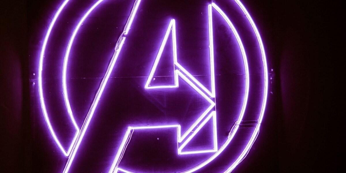 The Avengers logo in purple neon lights